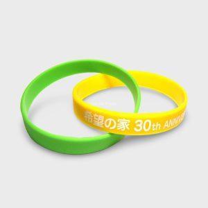 Dual silicone wristbands couple silicone barcelets with custom logo